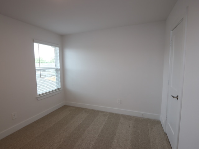 16208 Mcdonald County Ct, Montgomery, TX 77316 - carpeted empty room featuring baseboards