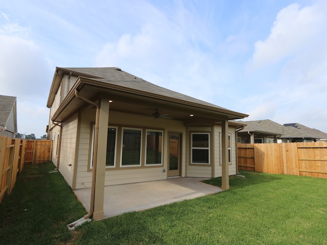 16208 Mcdonald County Ct, Montgomery, TX 77316 - rear view of property featuring a ceiling fan and a patio