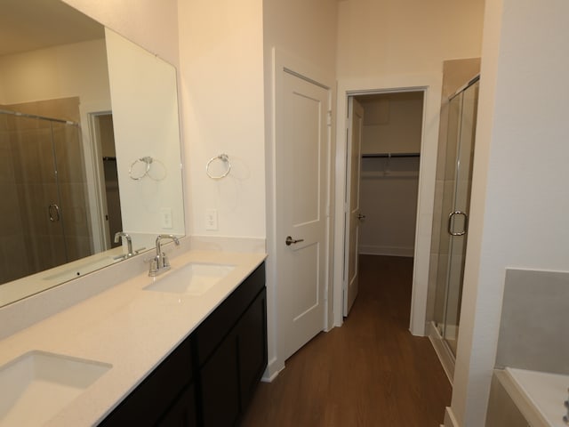 16208 Mcdonald County Ct, Montgomery, TX 77316 - bathroom featuring a stall shower and a walk in closet