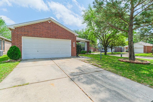 919 Ballardwood Ct, Spring, TX 77373 - view of front facade featuring a garage, brick siding, cooling unit, and a front lawn
