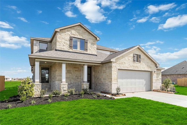 view of front of home featuring stone siding, an attached garage, a front yard, driveway, and a shingled roof