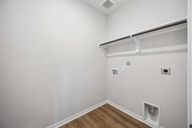 laundry area featuring hookup for an electric dryer, hookup for a washing machine, visible vents, laundry area, and hookup for a gas dryer
