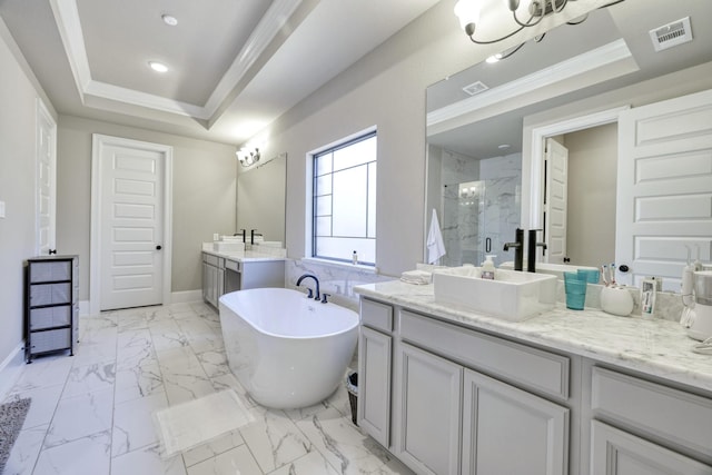 17473 Chestnut Cove Dr, Conroe, TX 77302 - bathroom with a marble finish shower, a tray ceiling, vanity, a soaking tub, and crown molding