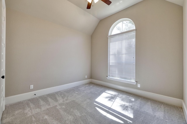 17473 Chestnut Cove Dr, Conroe, TX 77302 - empty room with a ceiling fan, lofted ceiling, carpet, and baseboards