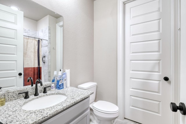 17473 Chestnut Cove Dr, Conroe, TX 77302 - full bathroom with vanity, toilet, and curtained shower