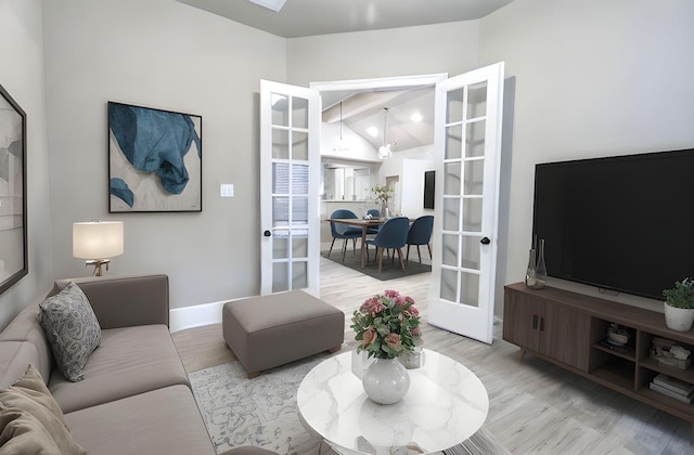 17473 Chestnut Cove Dr, Conroe, TX 77302 - living area featuring light wood-style flooring and baseboards