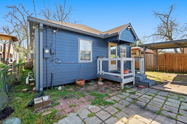 413 Mulcahy St, Rosenberg, TX 77471 - back of house with a fenced backyard and a wooden deck