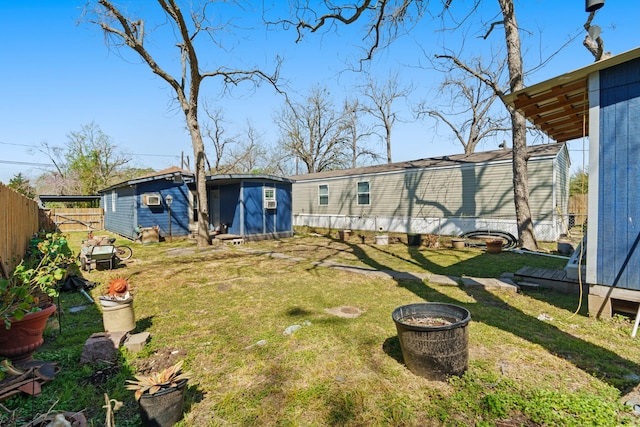 413 Mulcahy St, Rosenberg, TX 77471 - view of yard featuring fence and an outdoor structure