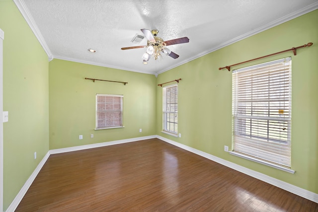 spare room with crown molding, baseboards, a textured ceiling, a ceiling fan, and wood finished floors