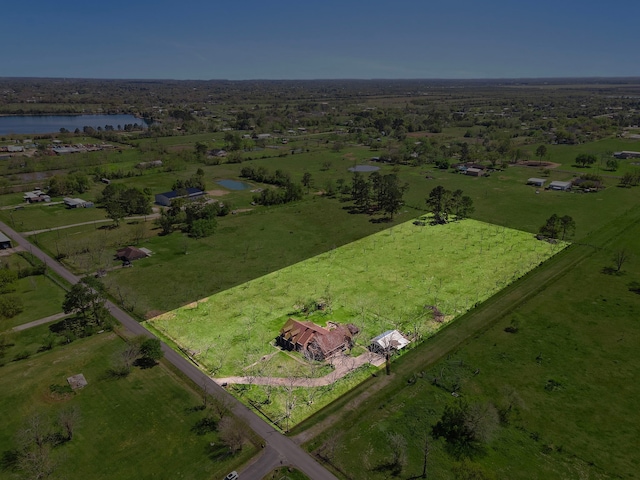 aerial view featuring a water view and a rural view