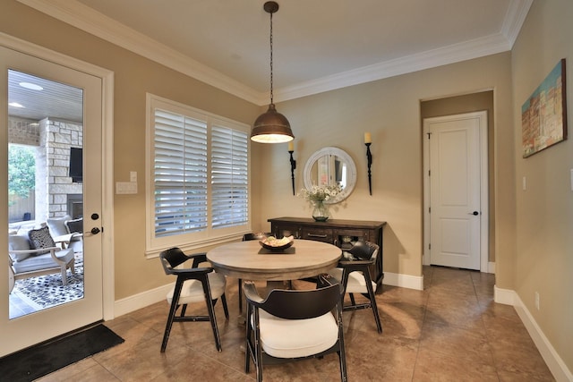 15614 Lake Iris Dr, Houston, TX 77070 - dining area with ornamental molding and tile patterned flooring