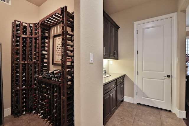 15614 Lake Iris Dr, Houston, TX 77070 - wine room featuring tile patterned floors and electric panel
