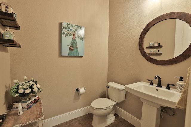 15614 Lake Iris Dr, Houston, TX 77070 - half bathroom with toilet and tile patterned flooring