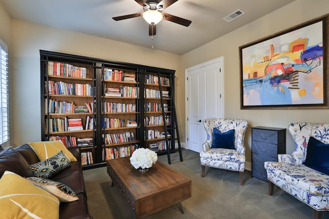 15614 Lake Iris Dr, Houston, TX 77070 - sitting room featuring a ceiling fan and carpet flooring