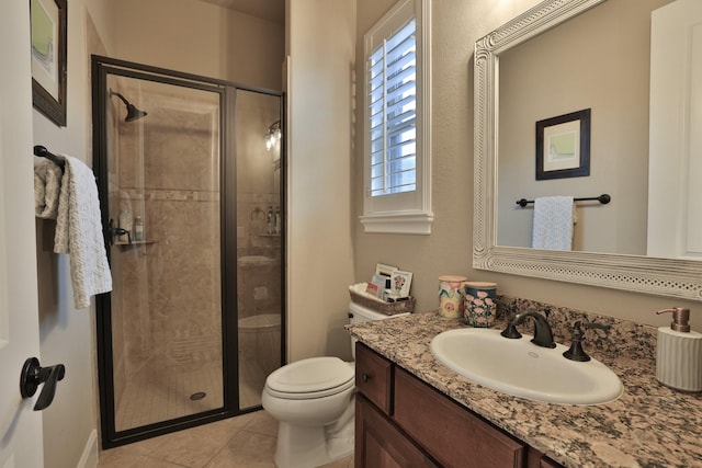15614 Lake Iris Dr, Houston, TX 77070 - full bathroom featuring vanity, a stall shower, and tile patterned floors