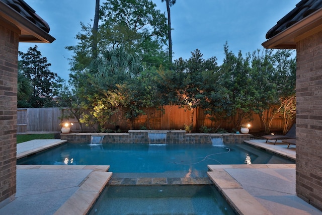 15614 Lake Iris Dr, Houston, TX 77070 - view of pool with a fenced backyard and a pool with connected hot tub