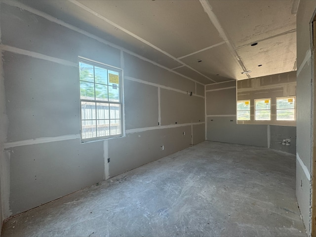 unfurnished room featuring a wealth of natural light