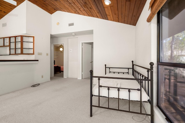 bedroom featuring carpet floors, high vaulted ceiling, visible vents, and wooden ceiling
