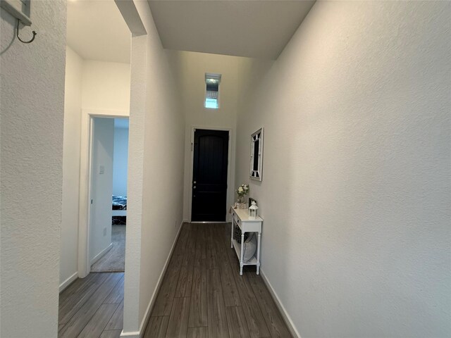 2412 Elliott Shore Ln, La Porte, TX 77571 - hall featuring baseboards and dark wood finished floors