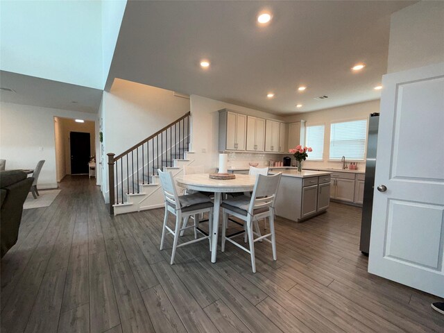 2412 Elliott Shore Ln, La Porte, TX 77571 - dining area with visible vents, recessed lighting, stairway, and dark wood finished floors