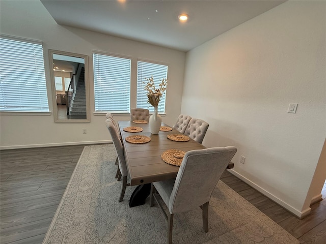 2412 Elliott Shore Ln, La Porte, TX 77571 - dining area with a wealth of natural light, baseboards, and wood finished floors