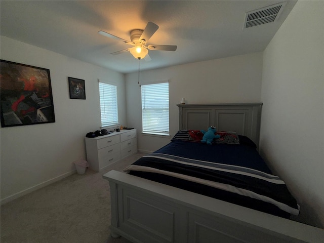 2412 Elliott Shore Ln, La Porte, TX 77571 - bedroom with ceiling fan, baseboards, light colored carpet, and visible vents