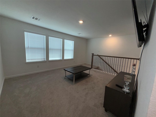 2412 Elliott Shore Ln, La Porte, TX 77571 - unfurnished room with an upstairs landing, recessed lighting, carpet, baseboards, and visible vents