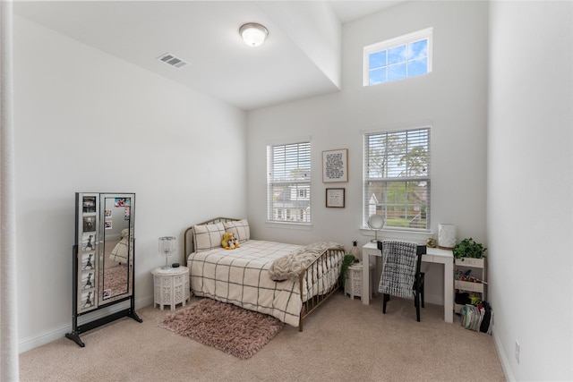 106 Golden Eye Ct, Montgomery, TX 77316 - carpeted bedroom featuring a towering ceiling and baseboards