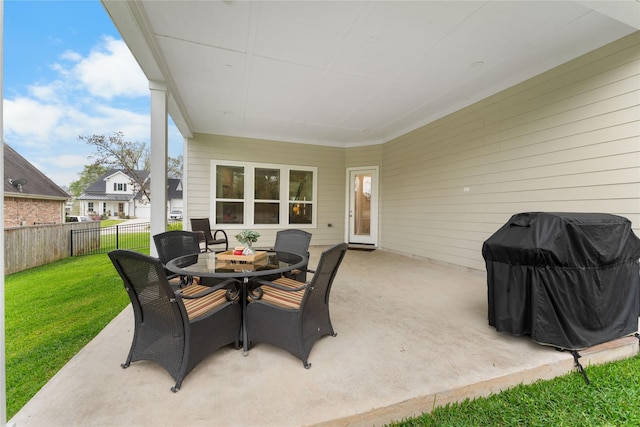 106 Golden Eye Ct, Montgomery, TX 77316 - view of patio featuring grilling area and outdoor dining space