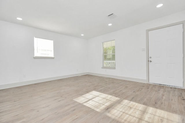 1501 Maiden Ln, Richmond, TX 77469 - unfurnished room featuring baseboards, light wood-type flooring, and recessed lighting