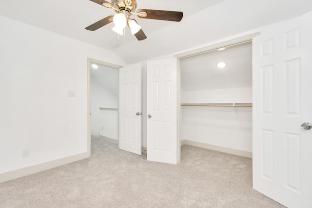 1501 Maiden Ln, Richmond, TX 77469 - unfurnished bedroom with baseboards, vaulted ceiling, a closet, and carpet floors