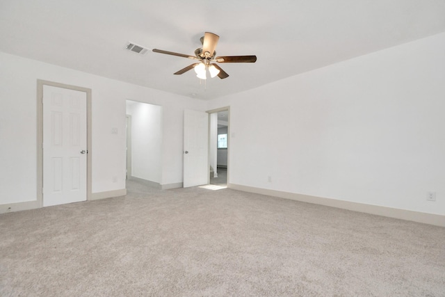 1501 Maiden Ln, Richmond, TX 77469 - empty room featuring a ceiling fan, light carpet, baseboards, and visible vents