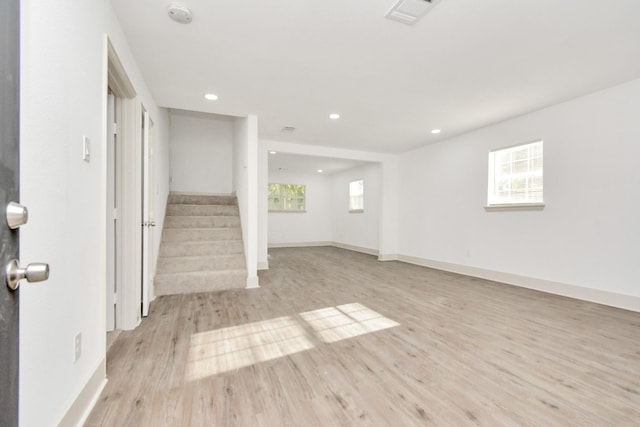 1501 Maiden Ln, Richmond, TX 77469 - basement with plenty of natural light, visible vents, stairway, and light wood-type flooring