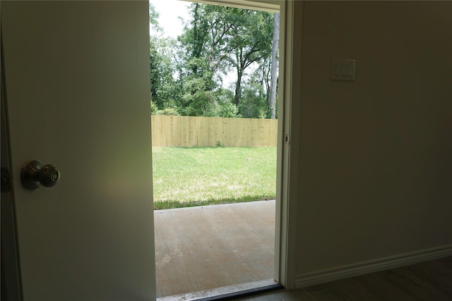 14848 Lamar Rd, Willis, TX 77378 - doorway to outside with wood finished floors