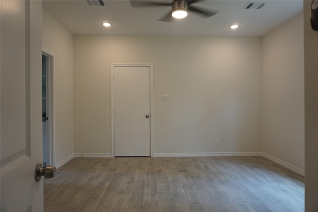14848 Lamar Rd, Willis, TX 77378 - empty room with a ceiling fan, baseboards, visible vents, and wood finished floors