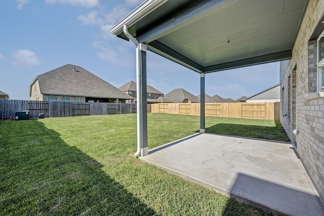 view of yard featuring a fenced backyard and a patio