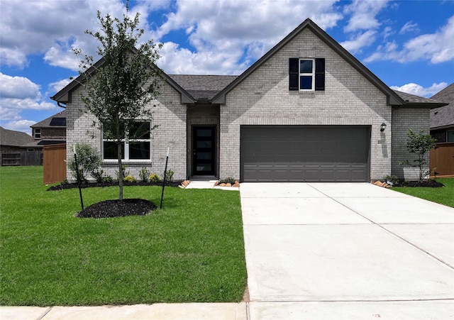 1907 Temple Grove Dr, Iowa Colony, TX 77583 - view of front of property with driveway and brick siding