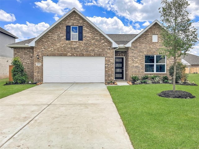 1826 Temple Grove Dr, Iowa Colony, TX 77583 - view of front of home with a front yard, concrete driveway, brick siding, a shingled roof, and a garage