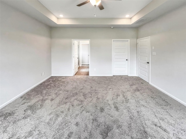 1826 Temple Grove Dr, Iowa Colony, TX 77583 - unfurnished bedroom with carpet flooring, a raised ceiling, baseboards, and recessed lighting