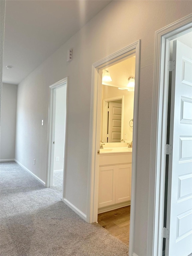 755 Red Mulberry St, La Marque, TX 77568 - corridor featuring light colored carpet and baseboards