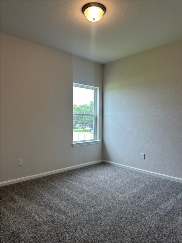 755 Red Mulberry St, La Marque, TX 77568 - empty room featuring carpet flooring and baseboards
