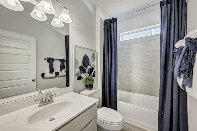 672 Woodhaven Lakes Dr, La Marque, TX 77568 - full bathroom featuring toilet, vanity, and shower / bath combo with shower curtain