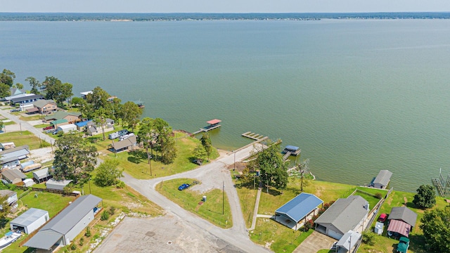 bird's eye view with a water view and a residential view