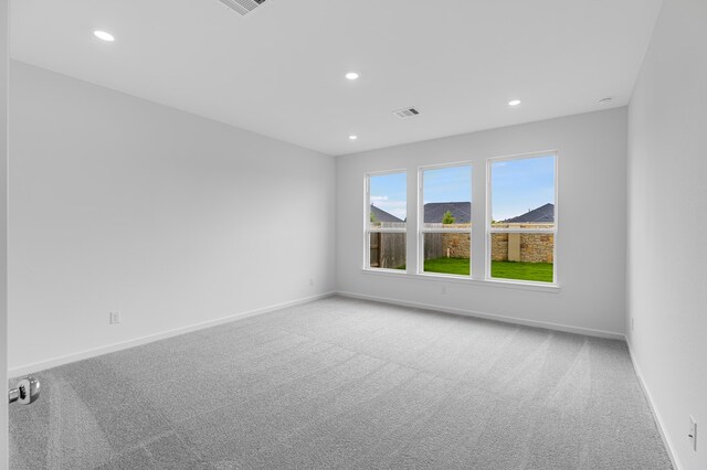 28810 Copper Ridge Dr, Fulshear, TX 77441 - carpeted spare room featuring baseboards and recessed lighting