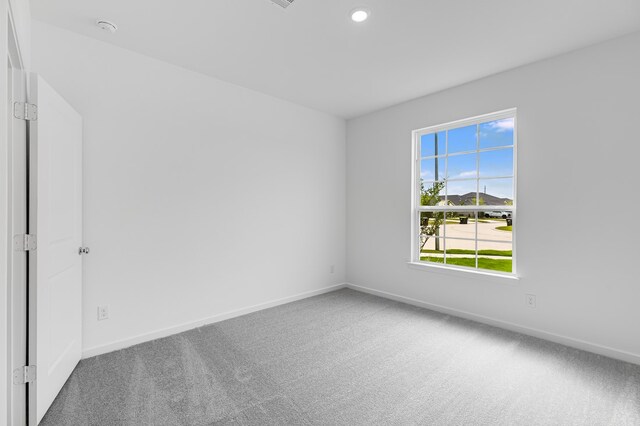 28810 Copper Ridge Dr, Fulshear, TX 77441 - carpeted empty room featuring a smoke detector and recessed lighting