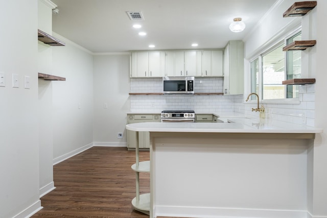 2007 Lamonte Ln, Houston, TX 77018 - kitchen featuring decorative backsplash, open shelves, a sink, appliances with stainless steel finishes, and visible vents