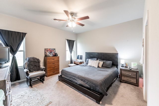 25843 Hickory Pecan Trl, Tomball, TX 77375 - bedroom with light carpet and ceiling fan