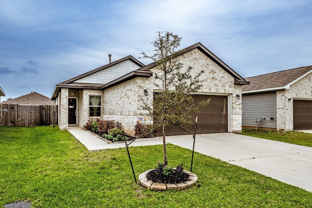 25843 Hickory Pecan Trl, Tomball, TX 77375 - view of front of house featuring a garage, driveway, and brick siding