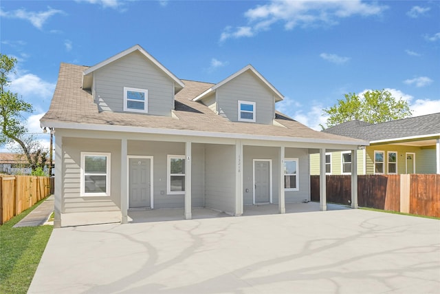 13218 Hp Johnson St A/B, Unit A/B Kendleton, TX 77451 - rear view of house featuring a patio, a shingled roof, and fence