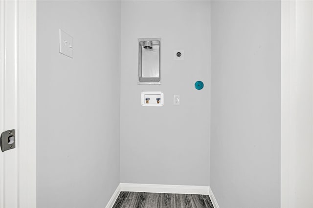 13218 Hp Johnson St A/B, Unit A/B Kendleton, TX 77451 - laundry room with hookup for a washing machine, baseboards, dark wood-type flooring, electric dryer hookup, and laundry area